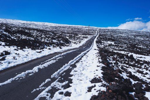 Mauna Loa road with snow; Big Island, Hawaii, United States of