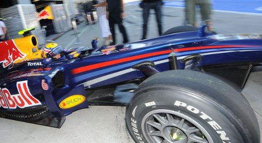 Australian driver Mark Webber of Red Bull drives out of the garage for the first training session at the Autodromo Nazionale race track in Monza Italy 10 September 2010. The 2010 Formula One Italian Grand Prix is held on 12 September 2010. Photo: ...