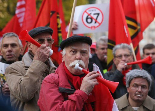 People take part in a demonstration organised by the trade union IG Metall against retirement at the age of 67 in Berlin Germany 27 October 2010. Photo: Stephanie