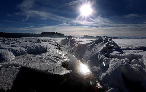 A creek is covered with ice in Salenwang Germany 30 November 2010. Photo: Karl-Joseph