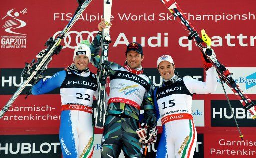 Christof Innerhofer of Italy (Silver) (L-R) Aksel Lund Svindal of Norway (Gold) and Peter Fill of Italy (Bronze) pose on the podium of the men\