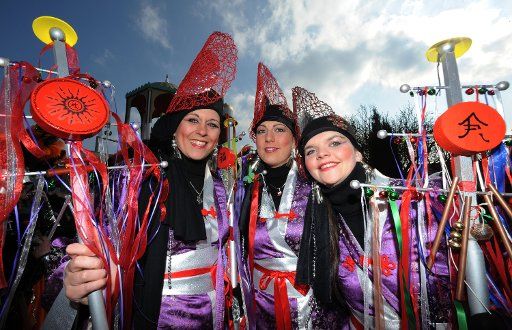 Costumed women attend the traditional Chinese Carnival in Dietfurt Germany 03 March 2011. Photo: ARMIN