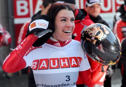 Canadian skeleton athlete Mellisa Hollingsworth cheers after the last round of the women\