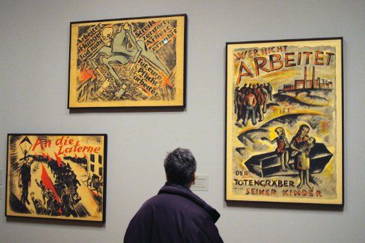 A visitor stands in the Museum of Modern Art (MoMa) in New York USA 27 March 2011. The large special exhibition "German Expressionism: The Graphic Impulse" shows masterpieces of German Expressionism and illuminates the historical and artistic ...