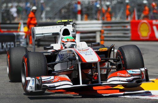 Mexican Formula One driver Sergio Perez of Sauber F1 comes through Piscine during the Qualifying session at the street circuit of Monte Carlo Monaco 28 May 2011. Vettel claimed Pole Position ahead of Button and Webber. The Formula 1 Grand Prix of ...