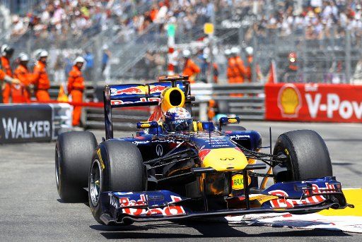 German Formula One driver Sebastian Vettel of Red Bull Racing comes through Piscine during the Qualifying session at the street circuit of Monte Carlo Monaco 28 May 2011. Vettel claimed Pole Position ahead of Button and Webber. The Formula 1 Grand ...