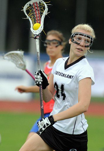 German national lacrosse player Charlotte Erdsiek is pictured during the U-19 Lacrosse World Championships against the Czech Republic at the Erika Fisch stadium in Hanover Germany 03 August 2011. The U-19 Lacrosse World Championships take place ...