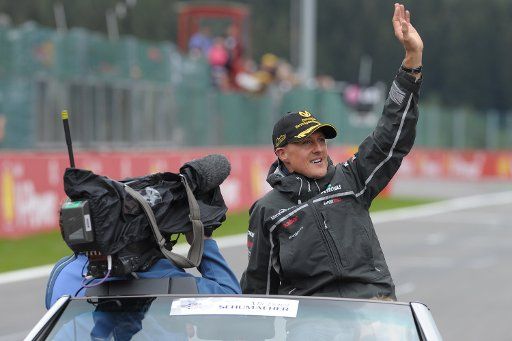 German Formula One driver Michael Schumacher of Mercedes GP waves to the fans during the drivers parade prior to the Formula One Grand Prix of Belgium at the race track Circuit de Spa-Francorchamps near Spa Belgium 28 August 2011. Photo: David ...