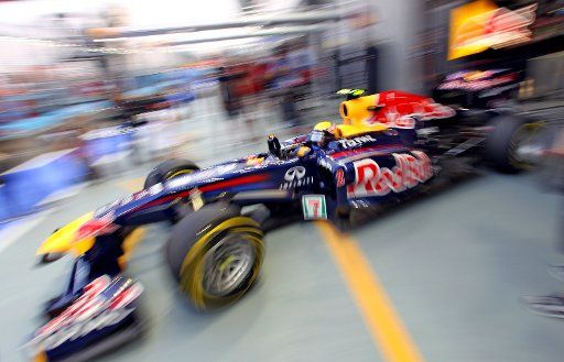 Australian Formula One driver Mark Webber of Red Bull steers his car during the first practice session through the pitlane at the race track Marina-Bay-Street-Circuit Singapore 23 September 2011. The Formula One Grand Prix of Singapore will take ...