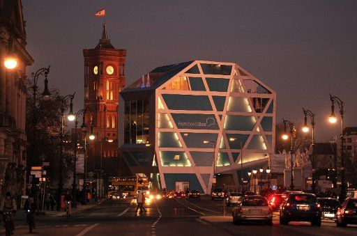 The Humboldt Box and the Red Town Hall are illuminated in the evening at the boulevard Unter den Linden in Berlin Germany 29 November 2011. Photo: Jens