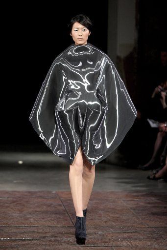 A model presents a creation by Dutch designer Iris Van Herpen during the Haute Couture Paris Fashion Week, in Paris, France, 23 January 2012. The presentation of the Spring-Summer 2012 Haute Couture collections takes place from 23 to 26 January. ...