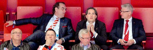 Uwe Harnos, President of DEB (l, up) and DEB-general secretary Franz Reindl (r) gestures during the Ice Hockey World Championships preliminary round match between Czech Republic and Germany at the Ericsson Globe Arena in Stockholm, Sweden, 15 May ...