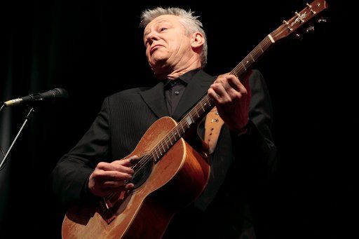 Australian musician Tommy Emmanuel performs on stage during a concert at the Tempodrom concert venue in Berlin, Germany, 12 April 2012. Photo: Lutz Mueller-