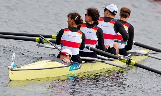 (l-r) Silver medalists Katrin Splitt, Anke Molkenthin, Astrid Hengsbach, Tino Kolitscher and Kai Kruse of Germany after the Rowing LTA Mixed Coxed Four Final A during the London 2012 Paralympic Games Rowing competition at Eton Dorney, Great Britain, ...
