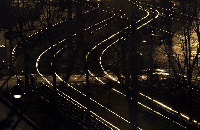The tracks of a tram reflect the sun in Freiburg, Germany, 3 December 2012. Photo: Patrick
