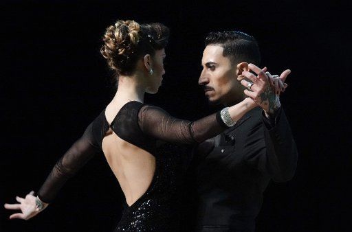 21 August 2019, Argentina, Buenos Aires: Julian Sanchez and Bruna Estellita from Argentina perform in the stage tango at the Tango World Championship. Photo: Florencia Martin\/