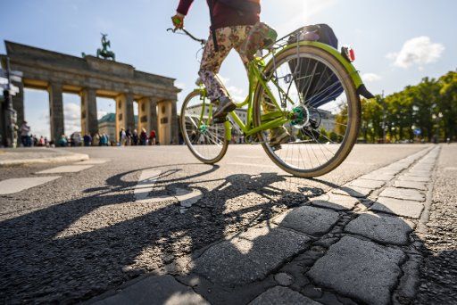 10 September 2019, Berlin: At the place where the Berlin Wall stood in GDR times, there are cobblestones in front of the Brandenburg Gate that recall the times of the Wall. Photo: Christophe Gateau\/