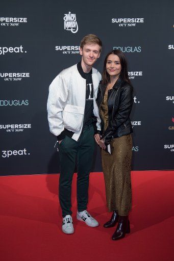 20 September 2019, Berlin: Timur Bartels with his girlfriend Michelle Math come to the E-Werk with his girlfriend Michelle Math. Photo: Jörg Carstensen\/