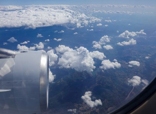 16 September 2019, Switzerland, ---: View from an airplane window over white clouds over the Alps of Switzerland. Photo: Jan Woitas\/dpa-Zentralbild\/