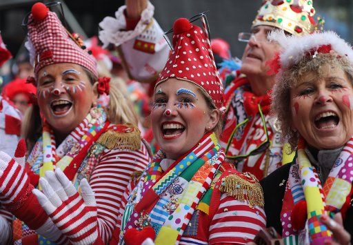 11 November 2019, North Rhine-Westphalia, Cologne: Carnivalists celebrate in the city. In Germany\