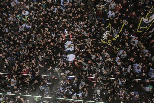 12 November 2019, Palestinian Territories, Gaza: Mourners carry the body of Palestinian Islamic Jihad leader Baha Abu Al-Atta during his funeral after an Israeli air strike targeted his house. Photo: Mohammed Talatene\/