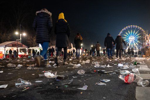 01 January 2020, Berlin: Garbage is lying in the street after the New Year\