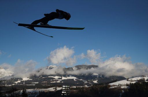 dpatop - 05 January 2020, Austria, Bischofshofen: Nordic skiing\/ski jumping: World Cup, Four Hills Tournament, large hill, men, training. Markus Eisenbichler, ski jumper from Germany, jumps during training. Photo: Daniel Karmann\/