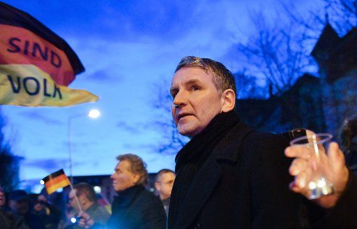 03 March 2020, Thuringia, Erfurt: Björn Höcke (r), head of the AfD parliamentary group in the Thuringian state parliament, protests with members and supporters of the AfD in the Thuringian state parliament against a possible election of the left-wing politician Ramelow. The latter could be elected Thuringian Minister President with CDU votes in the new elections. The demonstrators gathered in front of the state parliament building and moved to the state office of the CDU. Photo: Martin Schutt\/dpa-Zentralbild\/