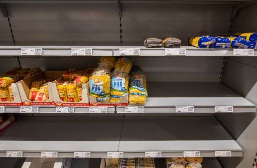 14 March 2020, Saxony, Dresden: An almost empty shelf in the pasta section can be seen in a supermarket. Photo: Robert Michael\/dpa-Zentralbild\/