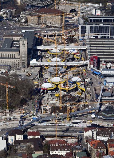 24 March 2020, Baden-Wuerttemberg, Stuttgart: The construction site of the billion-euro Stuttgart 21 railway project at the main station. (Aerial view with airplane) Photo: Uli Deck\/