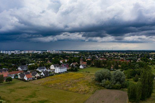29 June 2020, Brandenburg, Eiche: Dark clouds pass over the Brandenburg oak tree. (Aerial view with drone) Photo: Paul Zinken\/dpa-Zentralbild