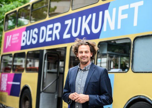 25 August 2020, Hessen, Frankfurt\/Main: Shai Hoffmann, social activist, is about to launch the pop-up project "Bus of the Future". With new events and a pop-up offer during the reconstruction phase, the Jewish Museum wants to bridge the period until the new opening. The "Bus of the Future" project (25 to 29 August 2020) will stop off at five locations in Frankfurt to discuss current social issues. Photo: Andreas Arnold\/dpa