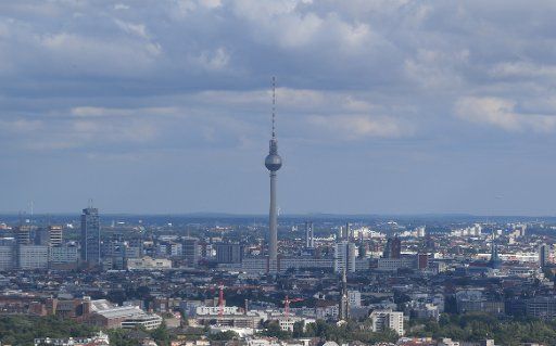 20 July 2020, Berlin: Clouds over the sky of Berlin and the television tower (shot from an airplane approaching Tegel). Photo: Britta Pedersen\/dpa-Zentralbild