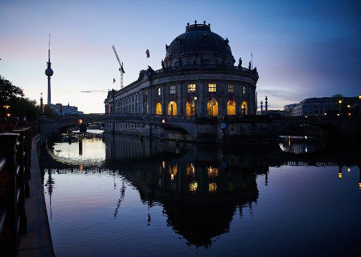 05 October 2020, Berlin: The Bode-Museum is reflected in the Spree in the morning. Photo: Annette Riedl\/dpa