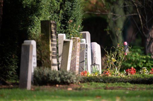 03 November 2020, Hamburg: There are gravestones at the Ohlsdorf cemetery. Photo: Daniel Reinhardt\/dpa