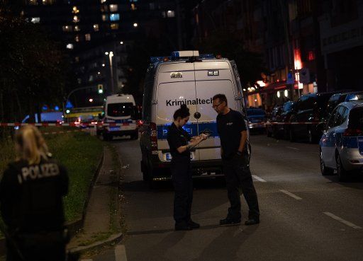 14 September 2020, Berlin: The emergency vehicle of the forensic department of the police is located on Goebenstraße. Several shots were fired there in the early evening, seriously injuring a 24-year-old man. The area around the crime scene was cordoned off. The Criminal Investigation Department has taken over the investigation. Photo: Paul Zinken\/dpa-Zentralbild\/dpa