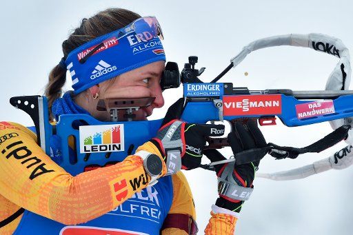 16 January 2021, Thuringia, Oberhof: Biathlon: World Cup, relay 4 x 6 km, women. Vanessa Hinz from Germany shooting at the start. Photo: Martin Schutt\/dpa-Zentralbild\/dpa