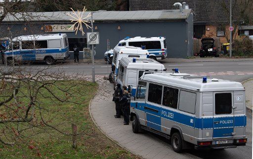 28 November 2020, Berlin: Emergency vehicles are parked in the district of Kladow at a meadow where demonstrators who oppose the Corona restrictions wanted to meet. The organizer had expected 500 participants. Photo: Paul Zinken\/dpa
