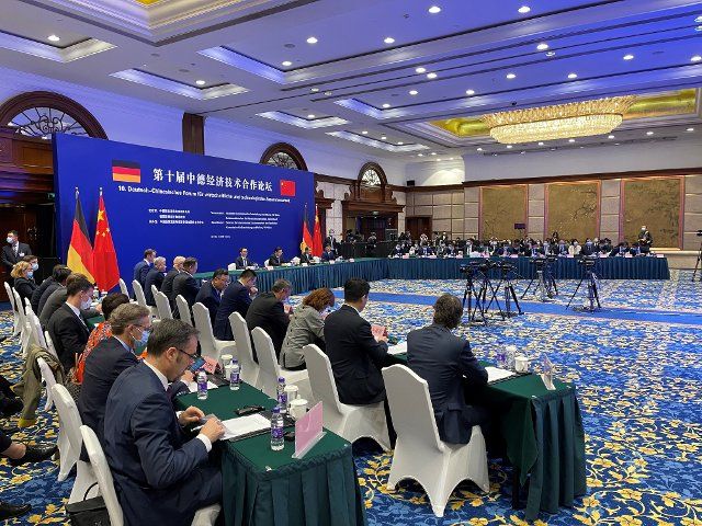 28 April 2021, China, Peking: On the occasion of the German-Chinese government consultations, around 100 company representatives are meeting in Beijing to discuss economic relations. Participants were also present from Germany. Photo: Andreas Landwehr\/dpa
