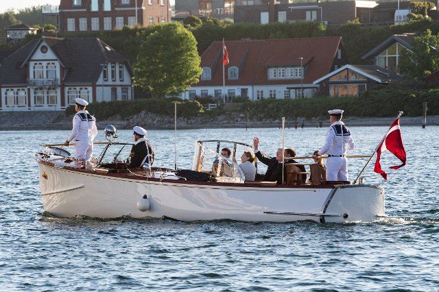 13 June 2021, Denmark, Sønderborg: Federal President Frank-Walter Steinmeier and his wife Elke Büdenbender are travelling by sloop to the royal yacht Dannebrog, which is moored off Sønderborg (Sonderburg) and where a dinner, given by the Danish Queen, will take place. German President Steinmeier and his wife are on a two-day visit to Denmark to mark the 100th anniversary of the drawing of the Danish-German border in 1920. The celebrations had to be postponed in 2020 for corona reasons and will now be made up for. Photo: Bernd von Jutrczenka\/dpa
