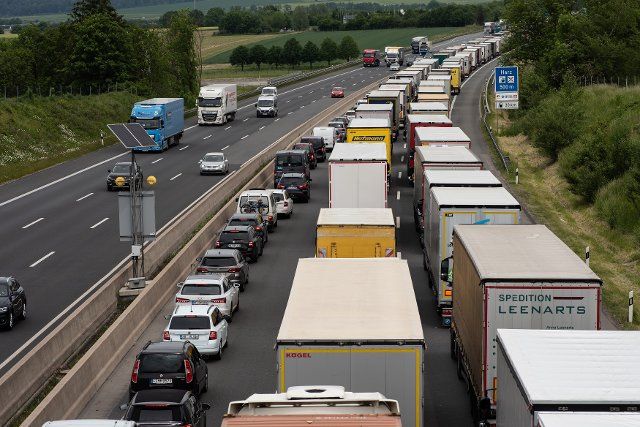 03 June 2021, Lower Saxony, Rhüden: Trucks and cars are jammed between the Rhüden and Bockenem junctions on the northbound A7 motorway. Photo: Swen Pförtner\/dpa