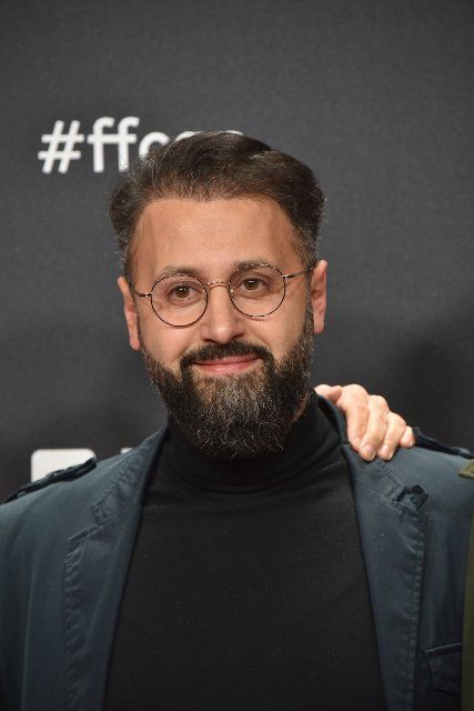 27 October 2021, North Rhine-Westphalia, Cologne: Actor Eddy Cheaib arrives for the screening of the film Westwall as part of the Film Festival Cologne. Photo: Horst Galuschka\/dpa
