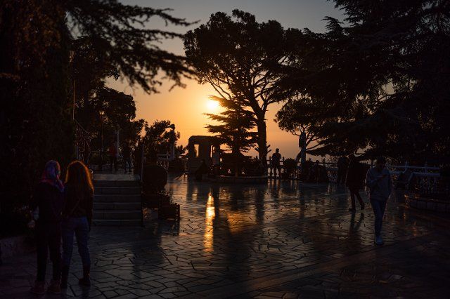 12 February 2022, Lebanon, Beirut: People visit the Christian pilgrimage site of Harissa, north of the Lebanese capital Beirut, at sunset. Photo: Arne BÃ¤nsch\/dpa