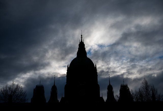 28 December 2021, Lower Saxony, Hanover: Clouds pass over the New Town Hall. Photo: Julian Stratenschulte\/dpa