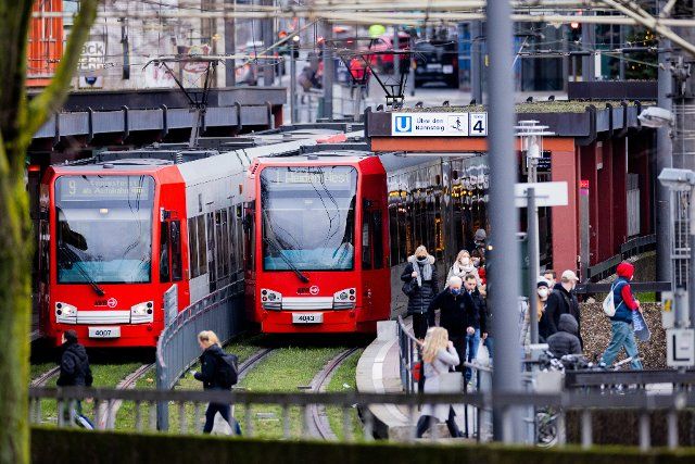 05 January 2022, North Rhine-Westphalia, Cologne: Streetcars of the Cologne public transport company (KVB) stand at a stop. Photo: Rolf Vennenbernd\/dpa
