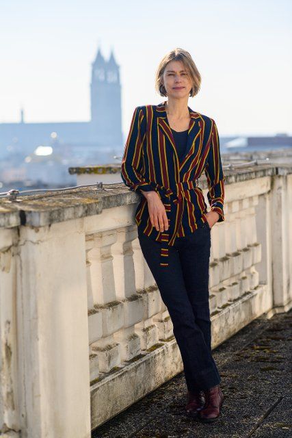 03 March 2022, Saxony-Anhalt, Magdeburg: Katja Hensel stands on a balcony above the rooftops of Magdeburg. Photo: Klaus-Dietmar Gabbert\/dpa-Zentralbild\/dpa