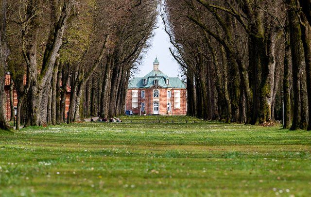 12 April 2022, Lower Saxony, Sögel: The historic central pavilion of Clemenswerth Castle stands at the end of an avenue in sunny weather. The hunting lodge built for Clemens August I of Bavaria now houses the Emsland Museum. Photo: Hauke-Christian Dittrich\/dpa