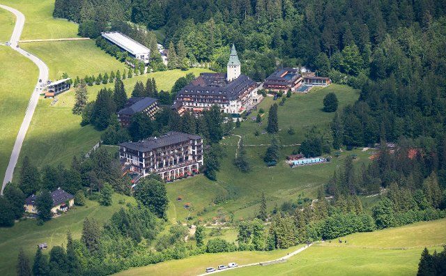 23 June 2022, Bavaria, Elmau: Elmau Castle photographed from a helicopter of the German Federal Police during a training flight. The G7 Summit is scheduled to take place at Schloss Elmau from June 26 to 28, 2022. Photo: Sven Hoppe\/dpa