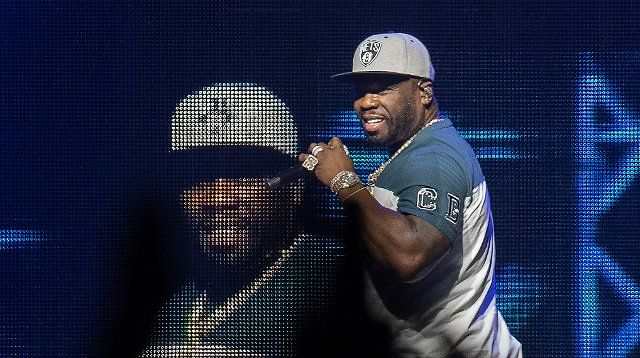 25 June 2022, Berlin: Rapper 50 Cent, real name: Curtis James Jackson, during his concert at the Mercedes-Benz Arena. Photo: Paul Zinken\/dpa