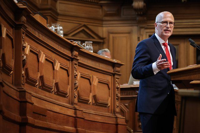 29 June 2022, Hamburg: Peter Tschentscher (SPD), First Mayor in Hamburg, speaks during the topical hour at a session of the Hamburg Parliament in City Hall. Photo: Christian Charisius\/dpa